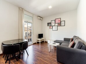 Apartment, 2 Bedrooms | Living area | Flat-screen TV
