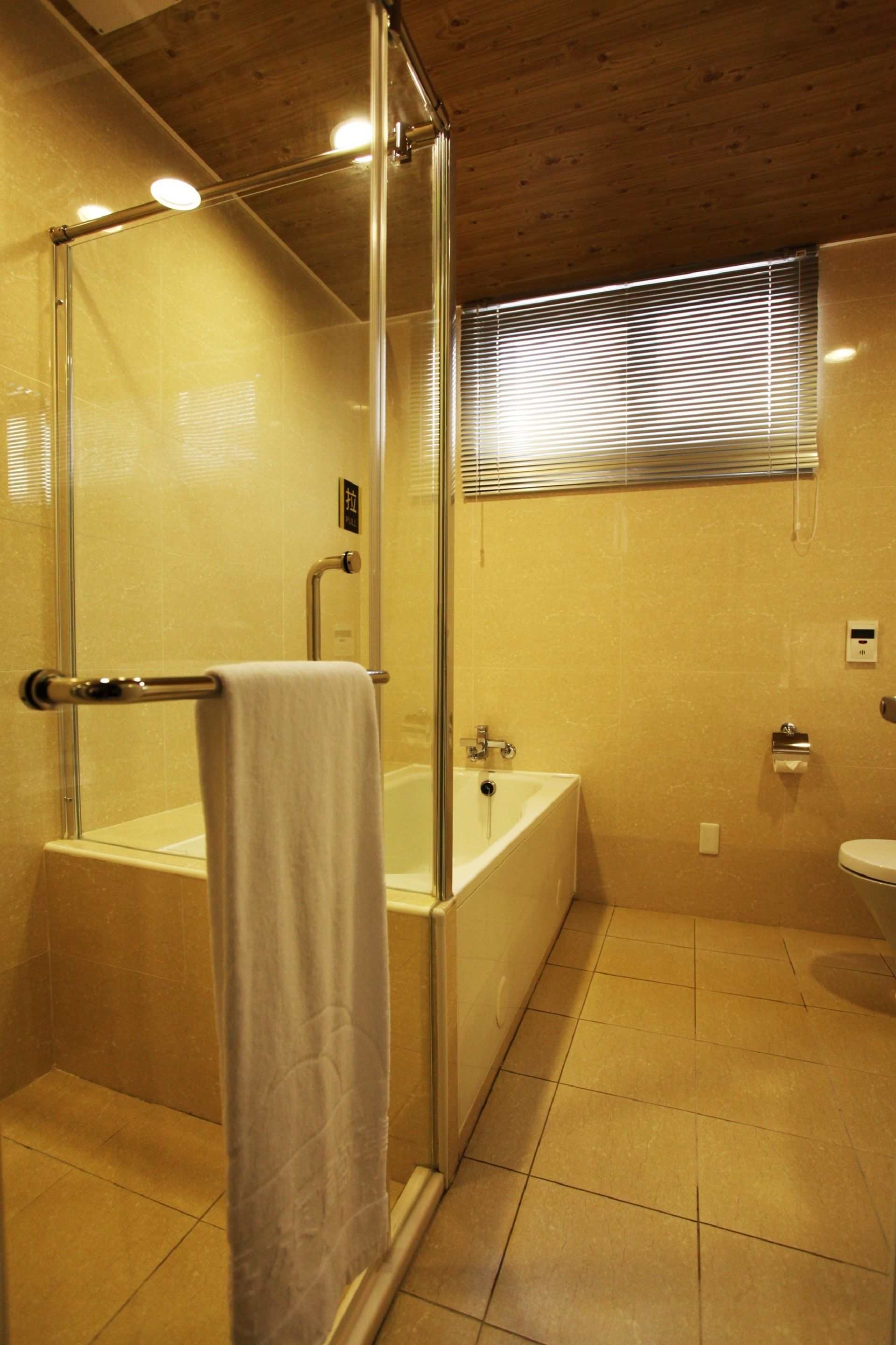 quadruple room | bathroom | free toiletries, hair dryer, slippers, towels