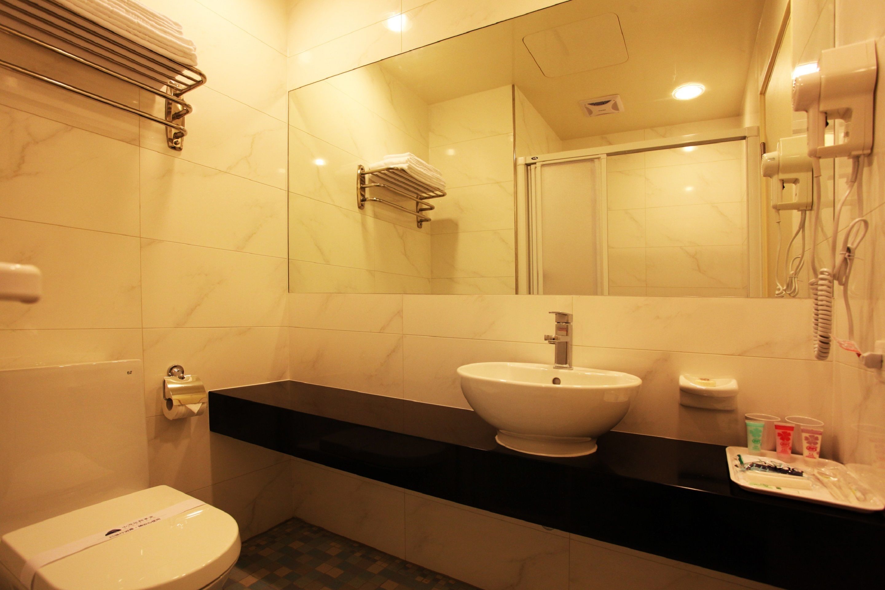 free toiletries, hair dryer, slippers, towels