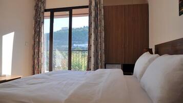 Chambre Deluxe | Minibar, coffres-forts dans les chambres, lits bébé (gratuits)