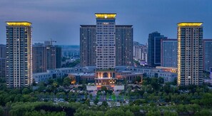 A high-rise building complex with multiple floors and a central courtyard.