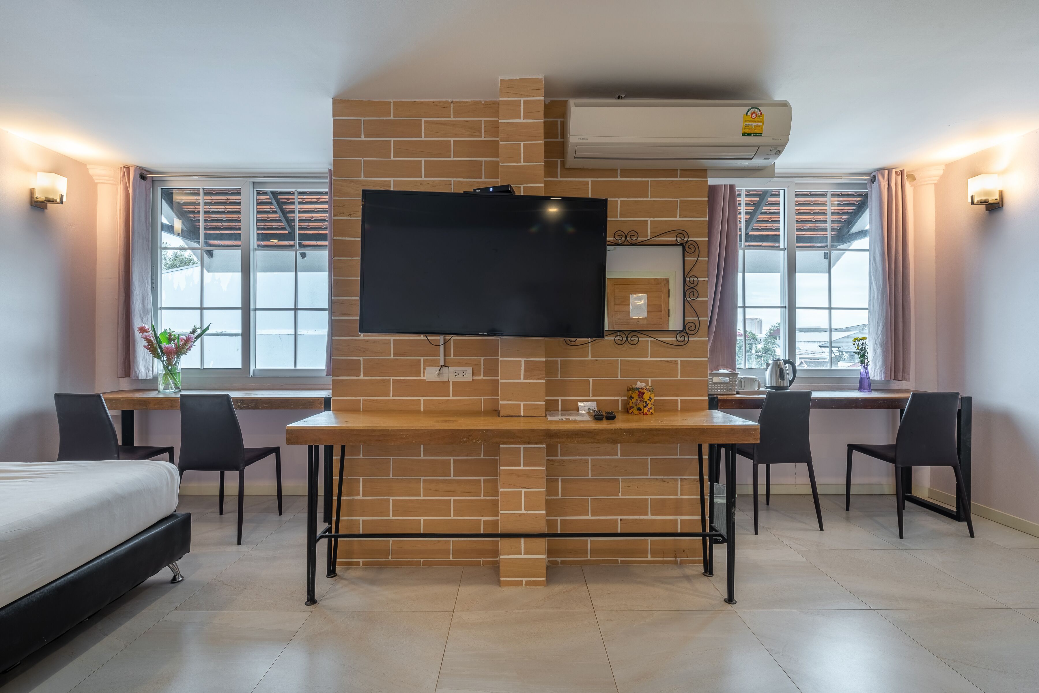 deluxe quadruple room | desk, laptop workspace, blackout curtains, soundproofing