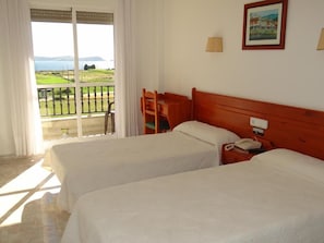 Desk, free cots/infant beds, WiFi, bed sheets