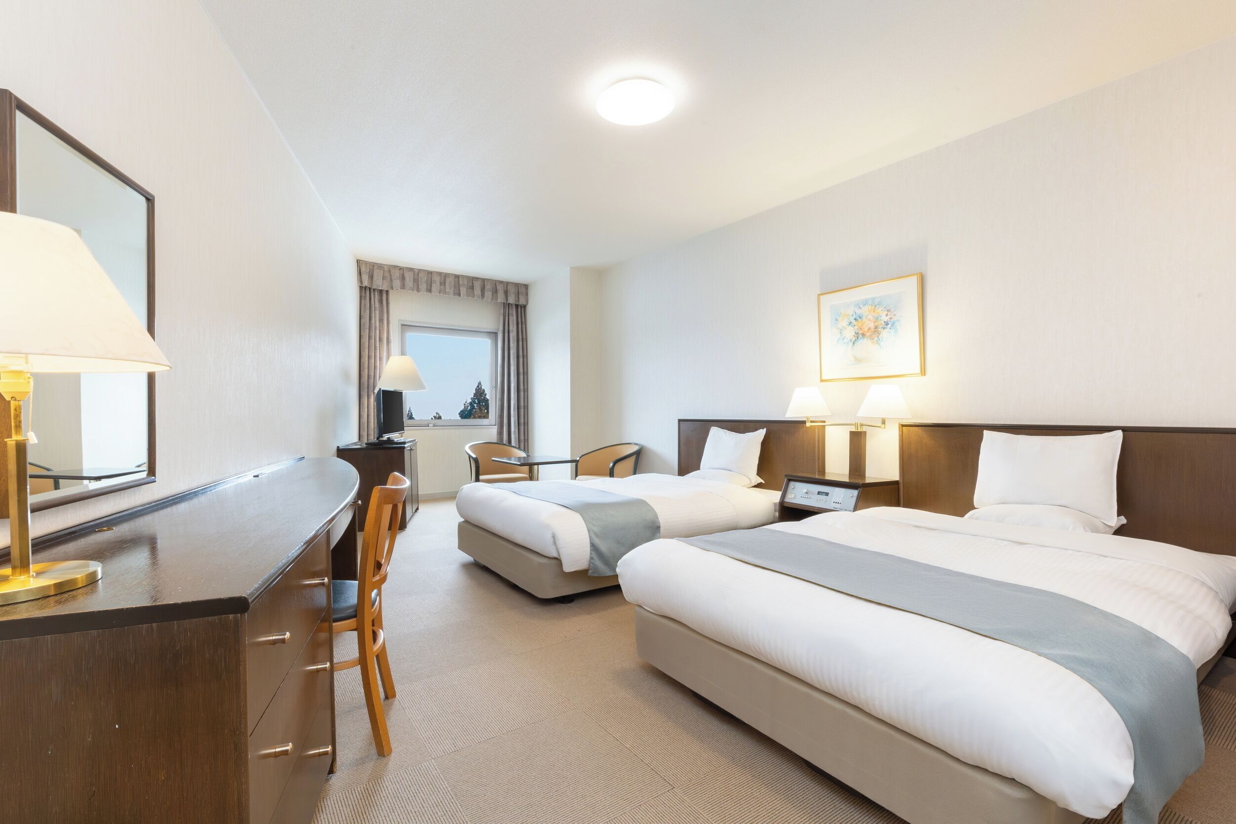 Standard Twin Room, Non Smoking | Down comforters, in-room safe, blackout drapes, iron/ironing board