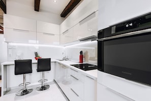 Studio (Sw.Filipa 21/12 street) | Private kitchen | Full-size fridge, microwave, stovetop, dishwasher