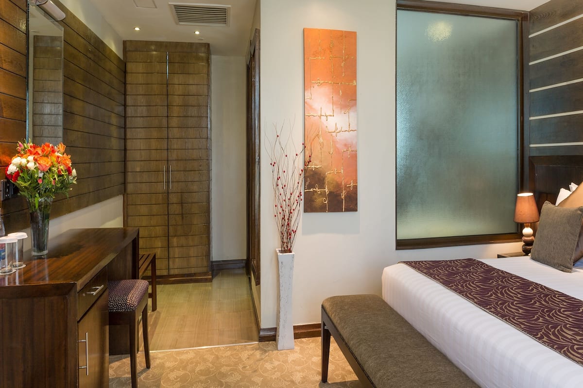 executive suite | 1 bedroom, premium bedding, minibar, in-room safe