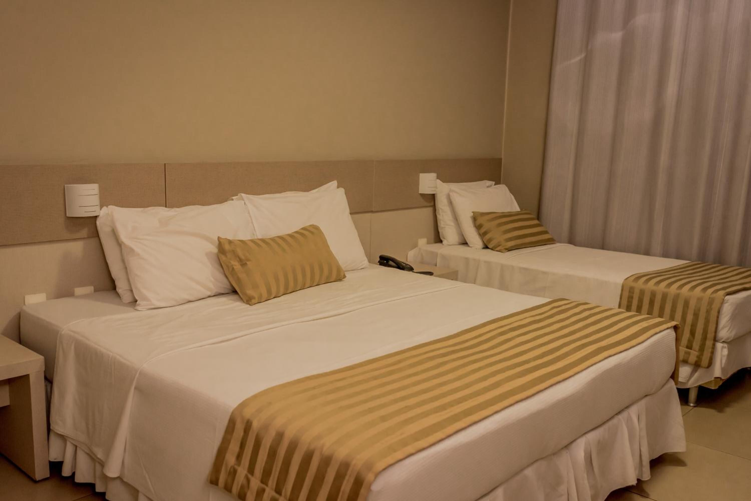 standard triple room | 1 bedroom, minibar, in-room safe, desk