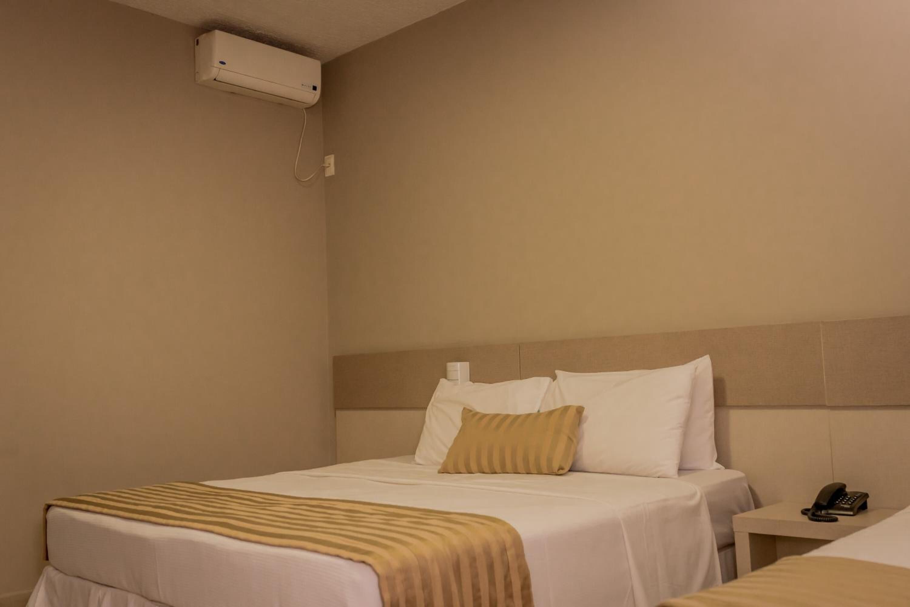 standard triple room | 1 bedroom, minibar, in-room safe, desk