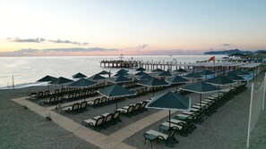 Private beach, sun-loungers, beach umbrellas