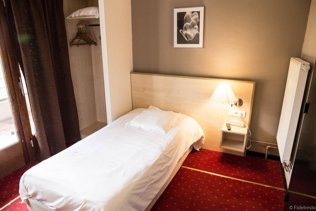Chambre simple, 1 lit jumeau, non-fumeur | Bureau, rideaux d’obscurcissement, fer et planche à repasser