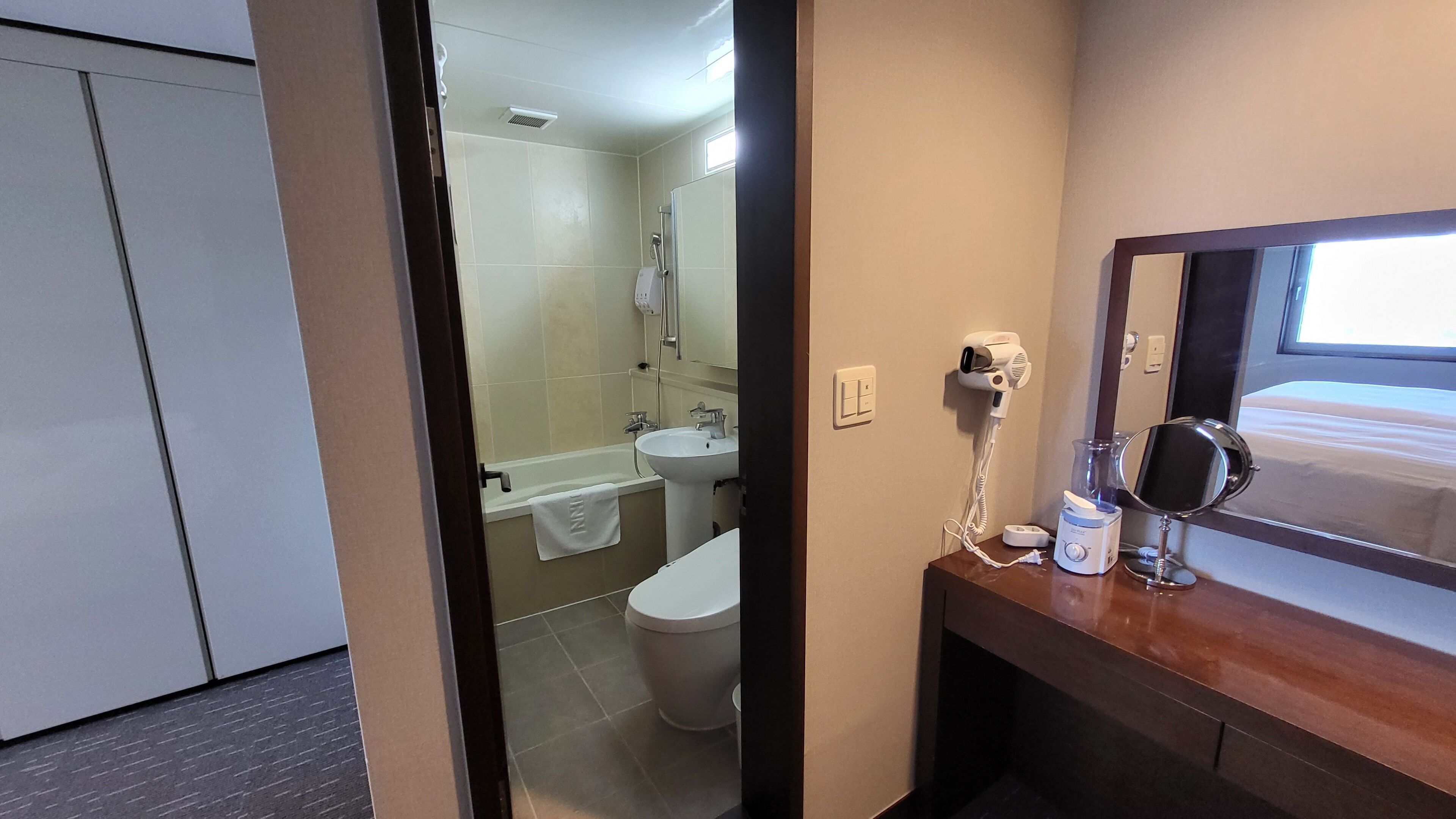 Suite, Non Smoking (No Party) | Bathroom | Combined shower/tub, deep soaking tub, hair dryer, slippers