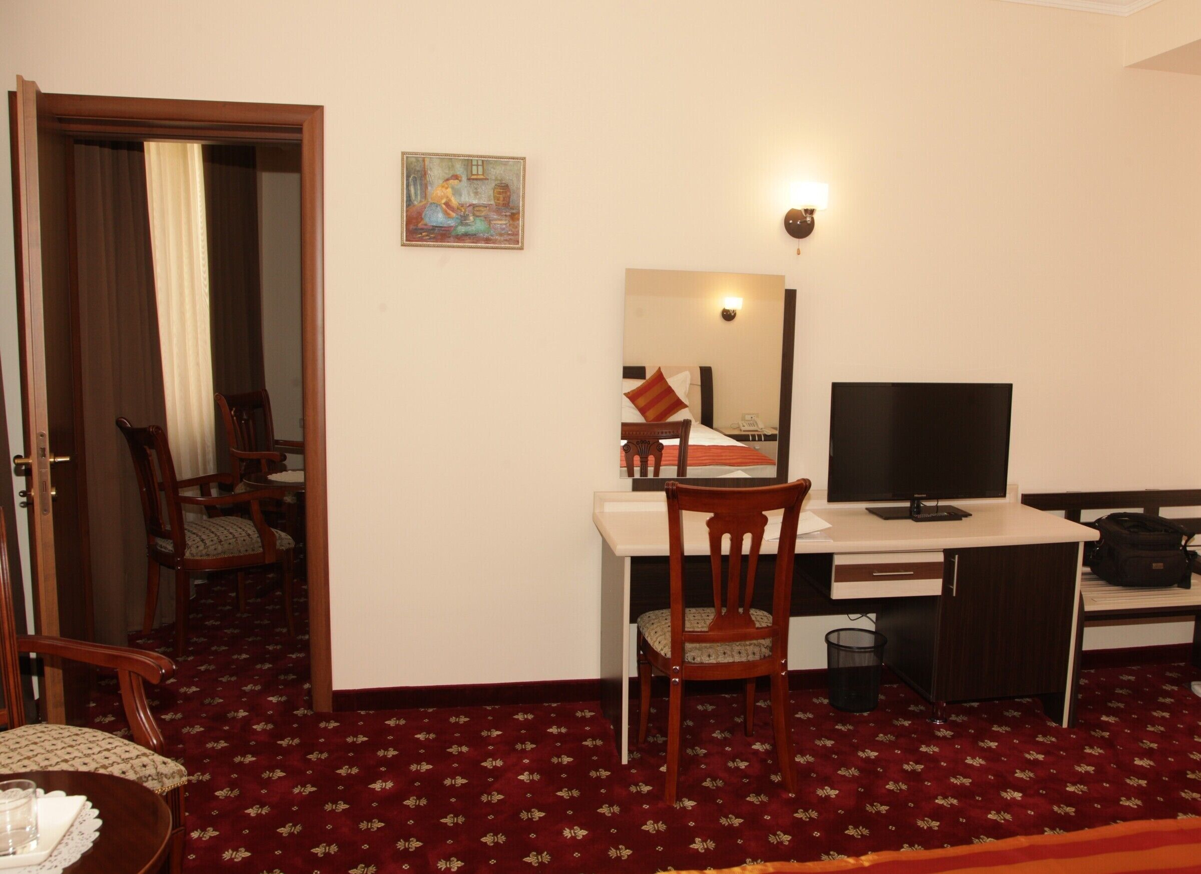 family room | premium bedding, minibar, in-room safe, desk