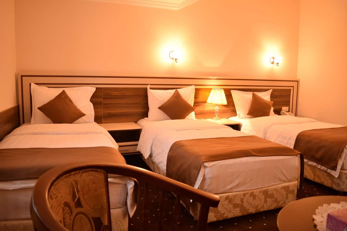 standard triple room | premium bedding, minibar, in-room safe, desk