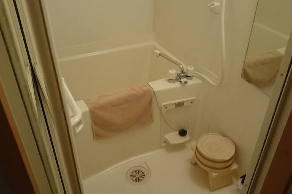 Bathroom | Separate tub and shower, deep soaking tub, hair dryer, slippers