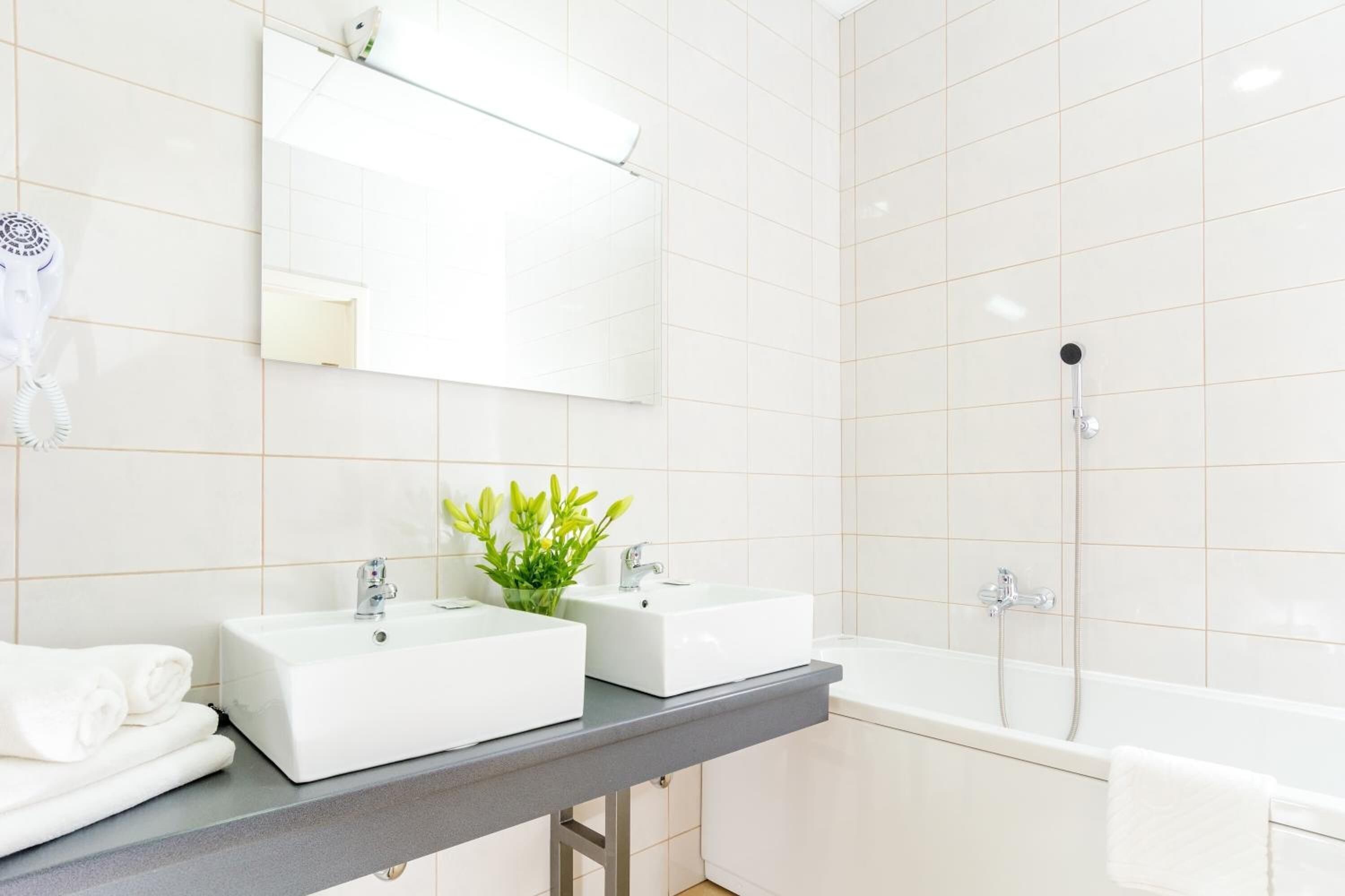 Bathtub, free toiletries, hair dryer, towels