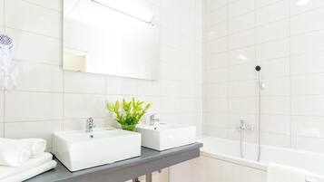 Bathtub, free toiletries, hair dryer, towels