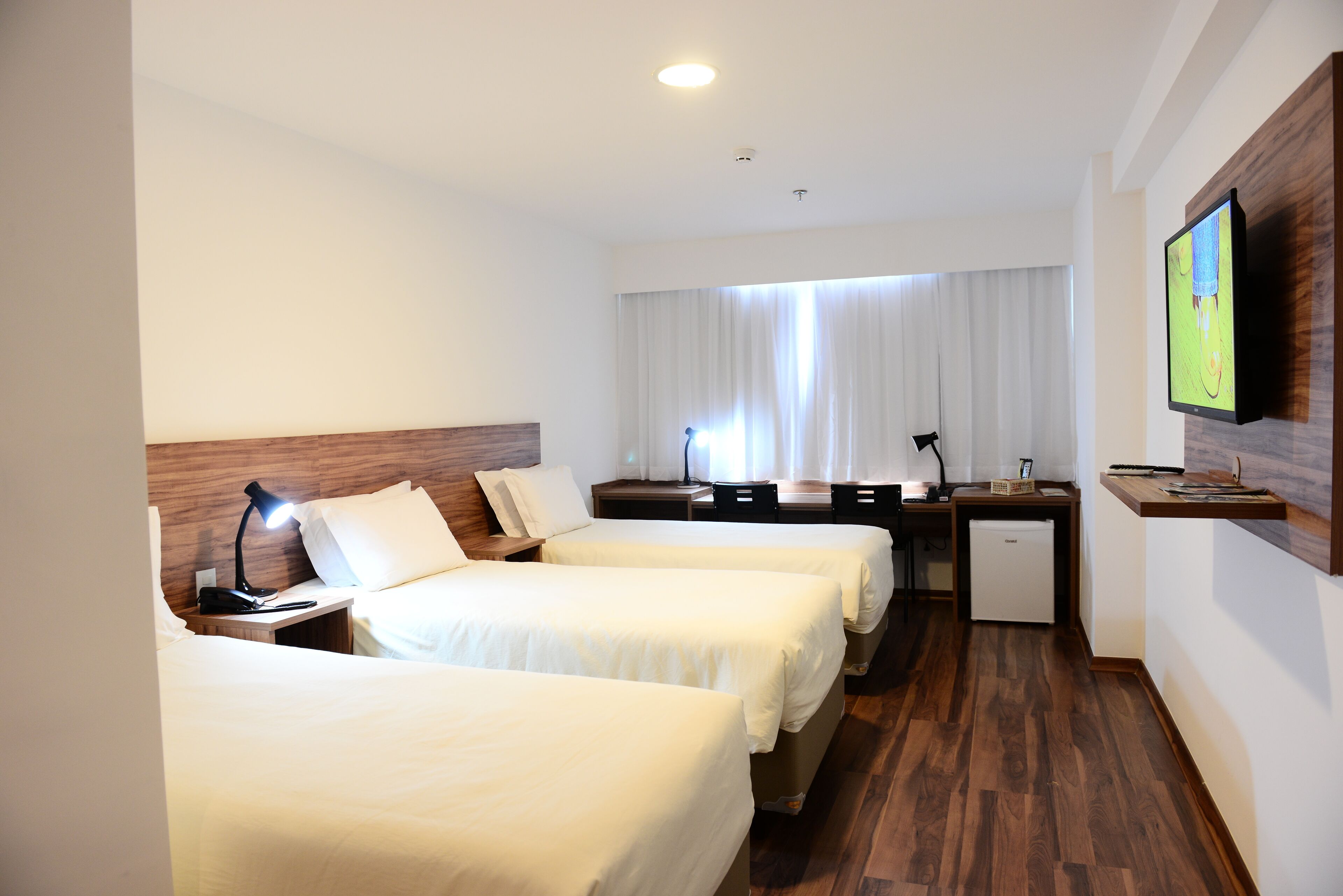 superior triple room | minibar, in-room safe, desk, blackout curtains