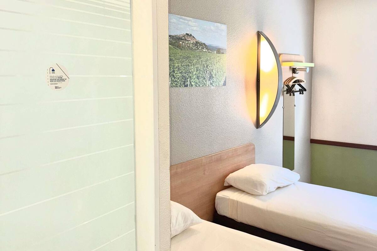 twin room, 2 single beds | desk, laptop workspace, blackout curtains, soundproofing