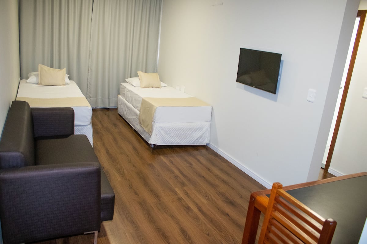 Superior Apartment | Living area | Flat-screen TV