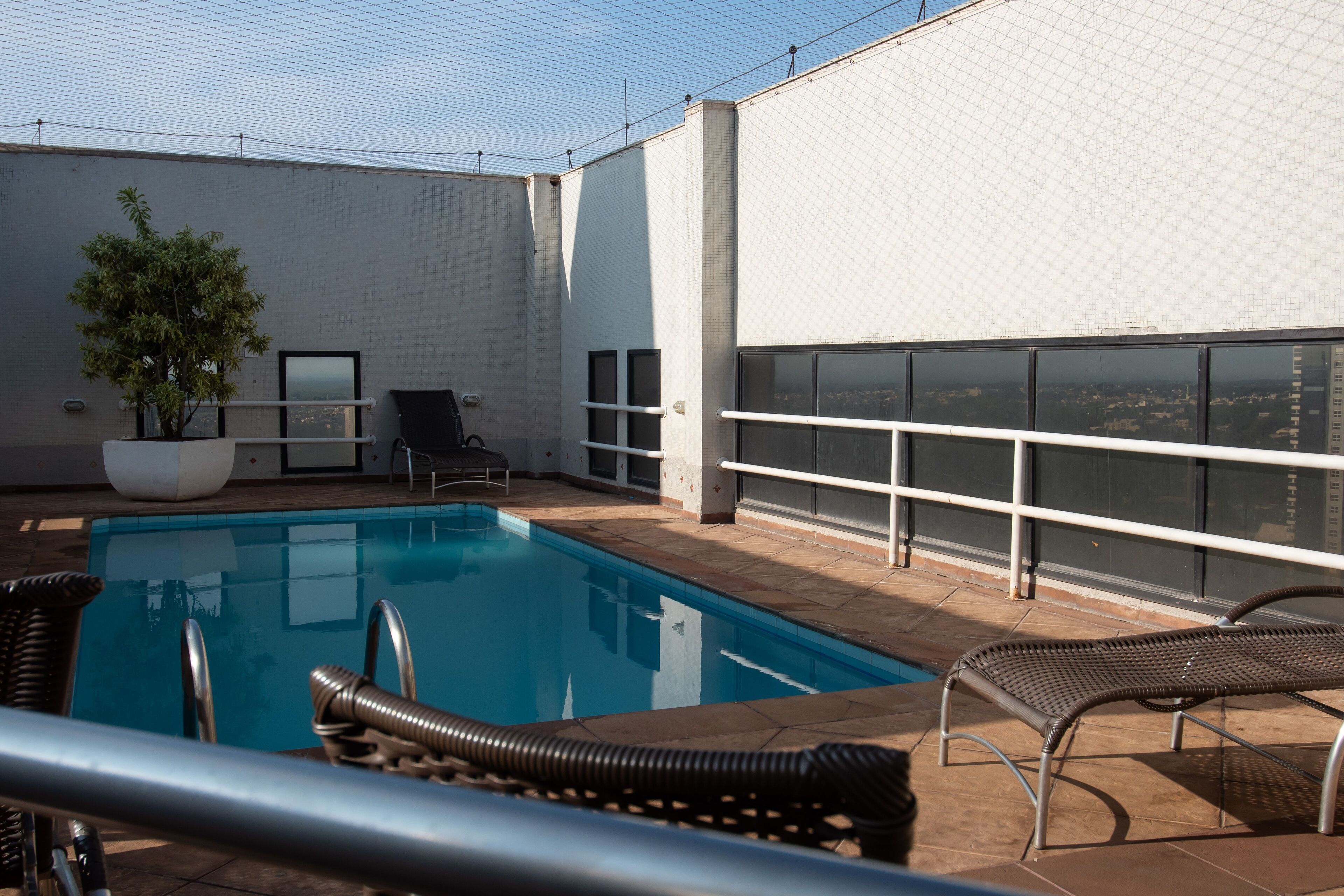 outdoor pool, pool loungers