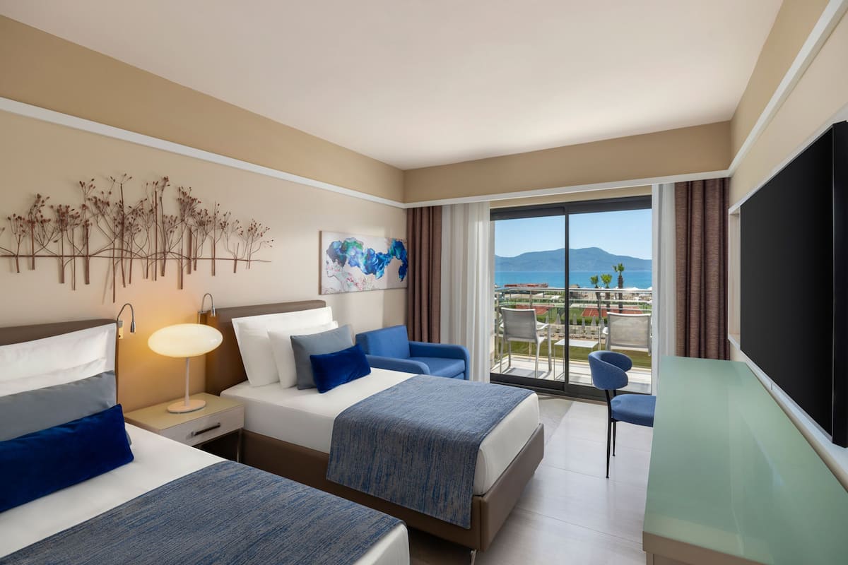 Superior Family Sea View Room | Free minibar, in-room safe, desk, iron/ironing board