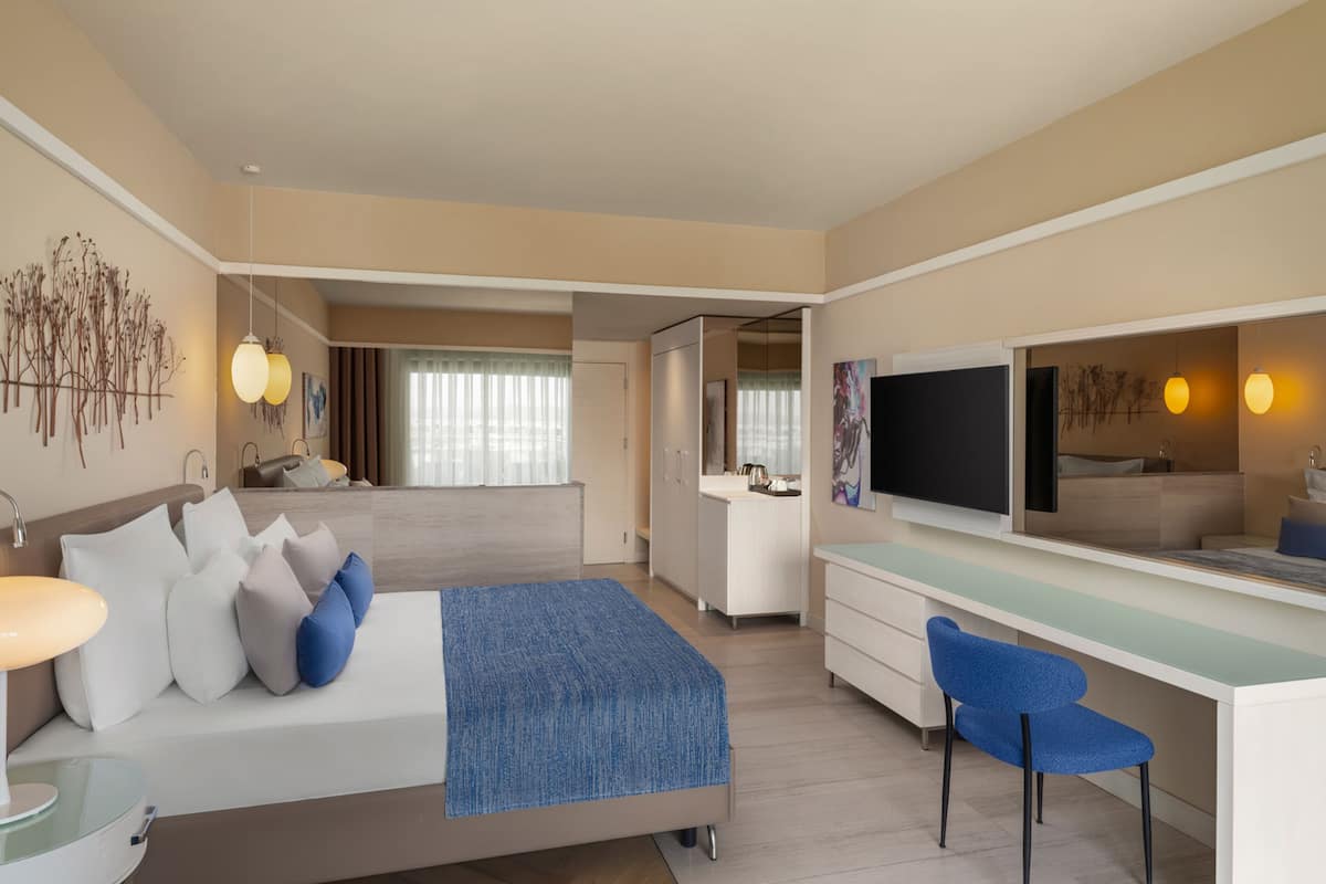 Adult Standard Partial Sea View Room | Free minibar, in-room safe, desk, iron/ironing board