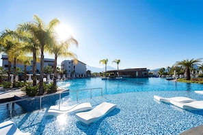Indoor pool, outdoor pool, open 8:00 AM to 7:00 PM, pool umbrellas
