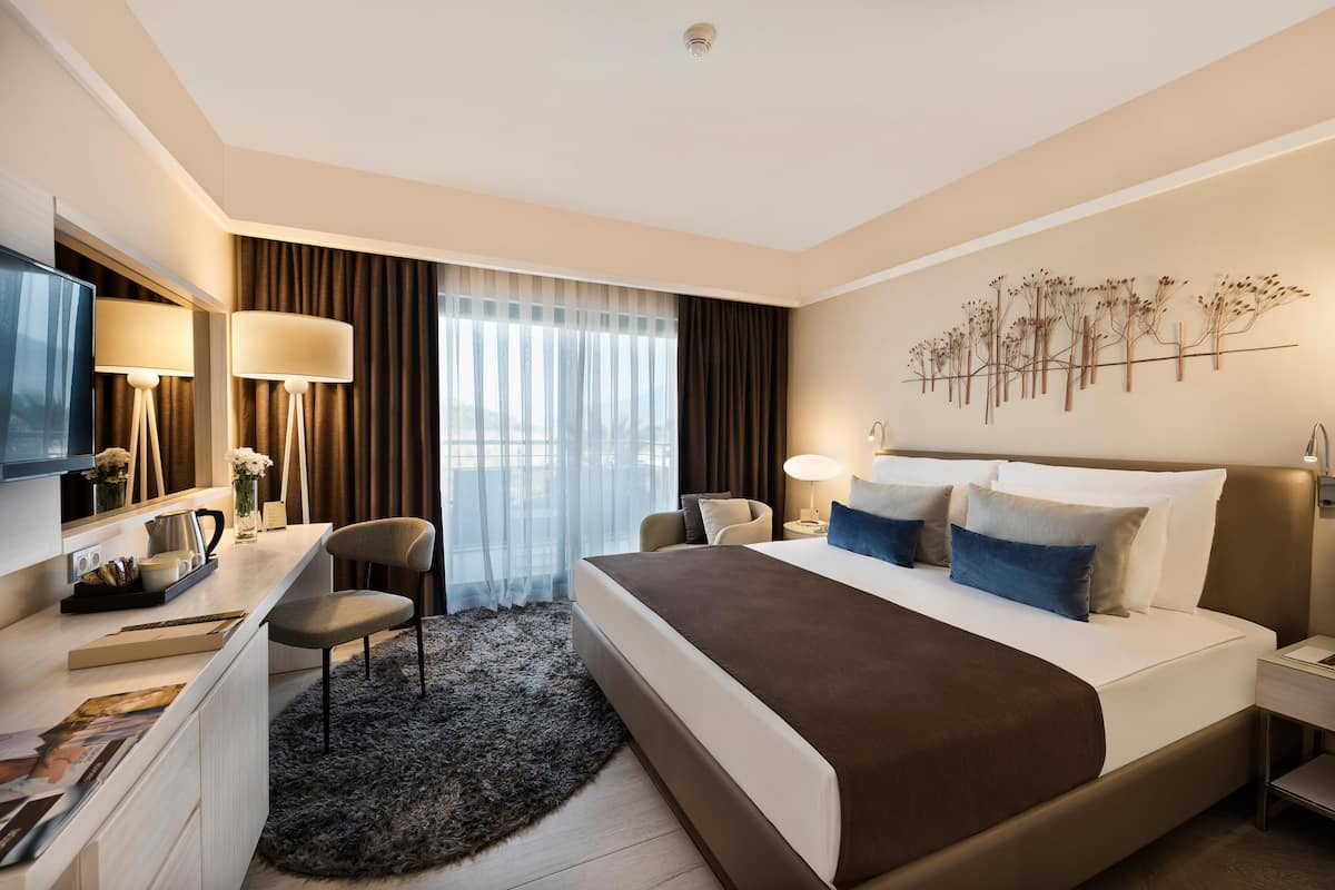 Free minibar, in-room safe, desk, iron/ironing board