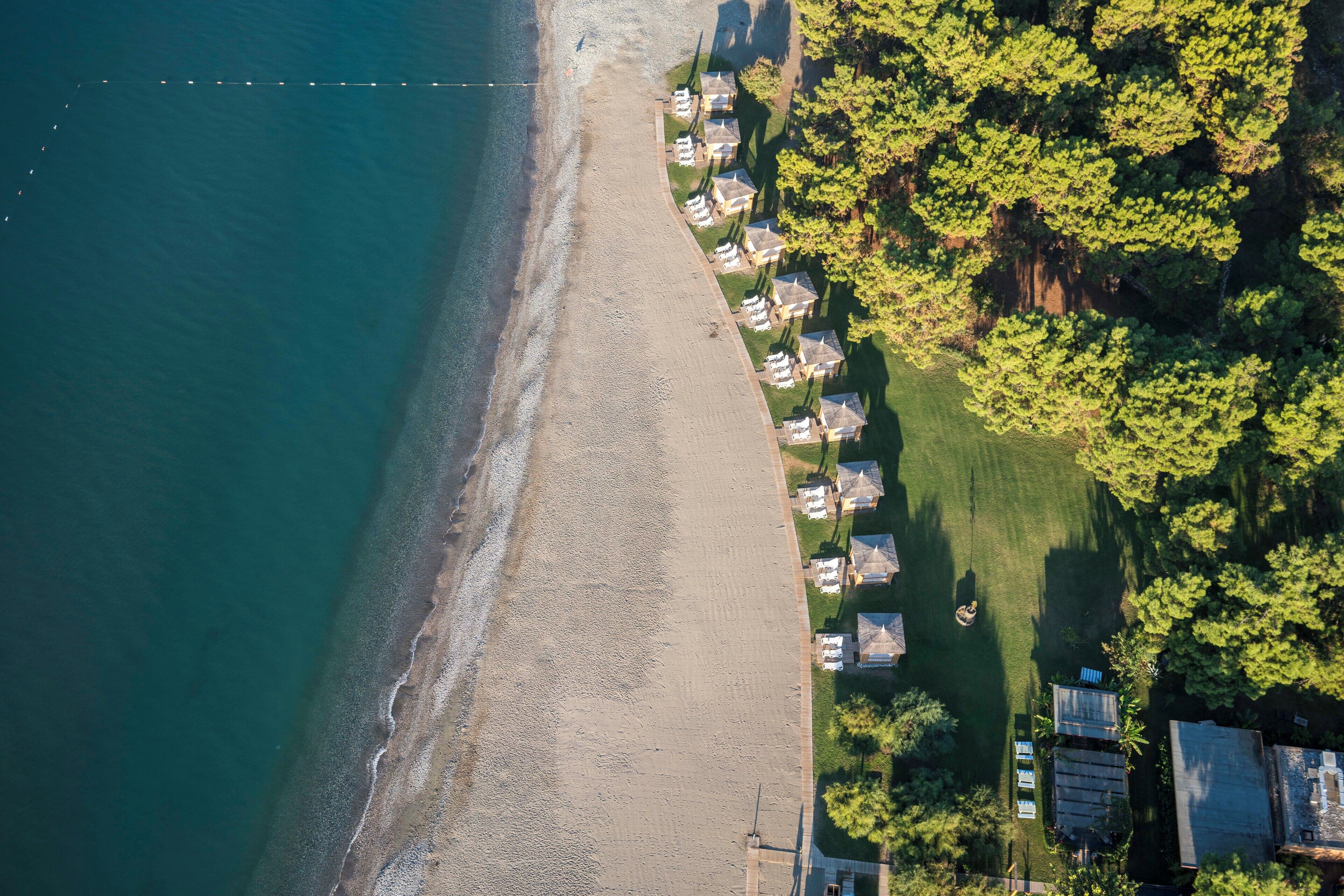 On the beach, sun-loungers, beach umbrellas, beach towels