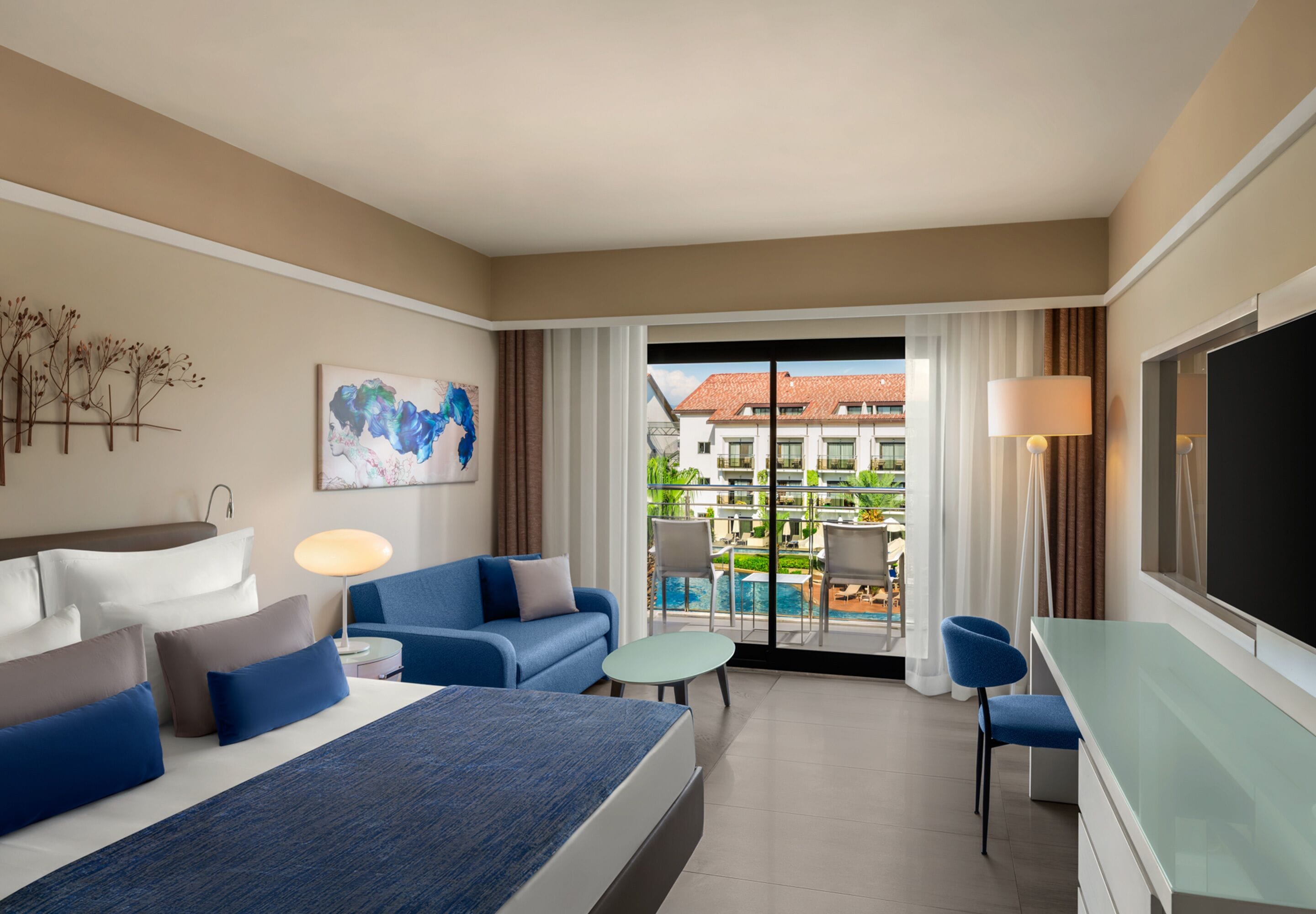 Habitación estándar, vista parcial al mar | Artículos del minibar gratis y caja de seguridad en la habitación 