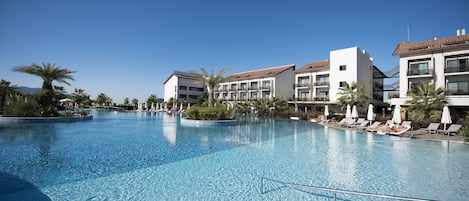 Indoor pool, outdoor pool, open 8:00 AM to 7:00 PM, pool umbrellas