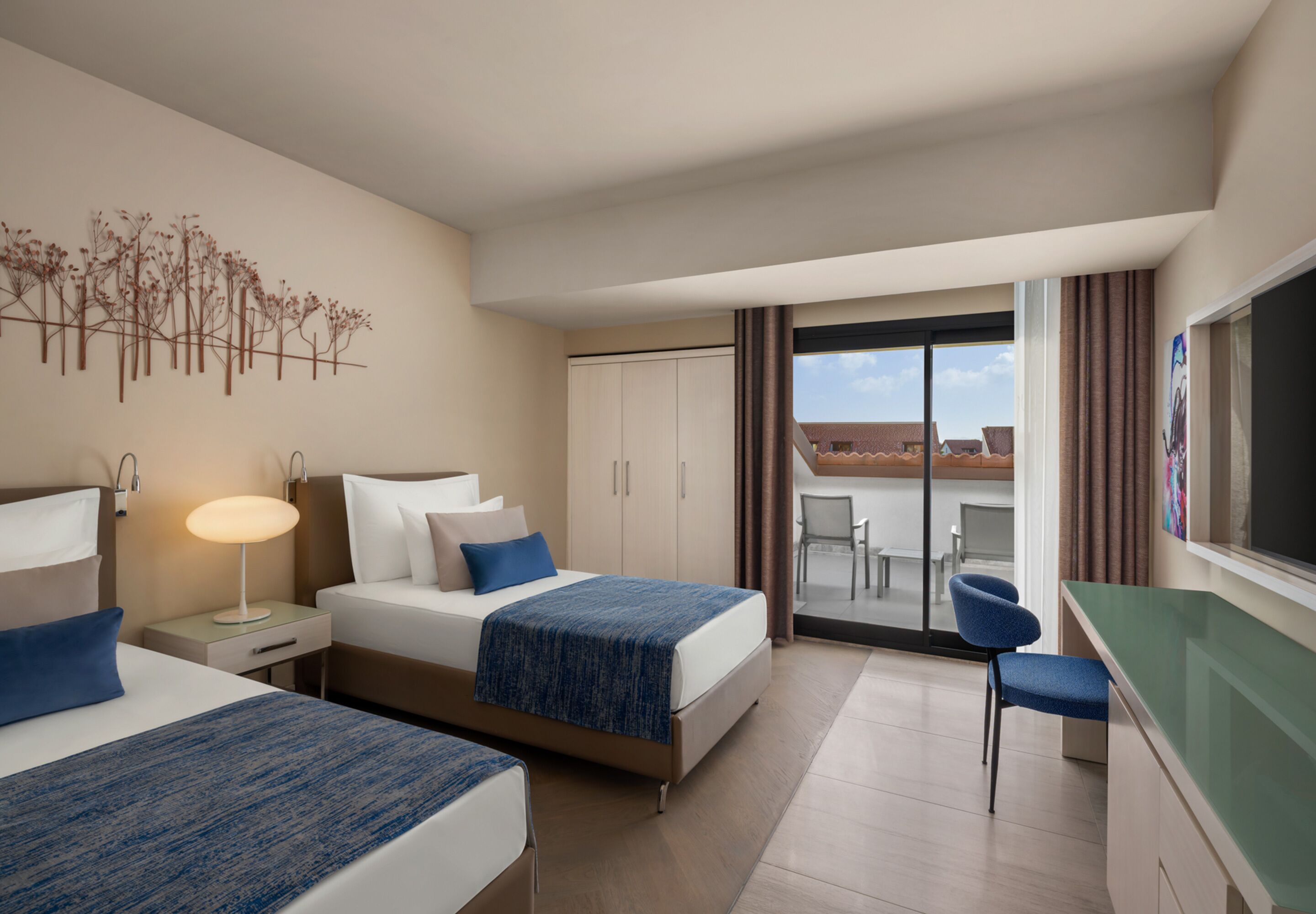 Superior Family Room with Partial Sea View | Free minibar, in-room safe, desk, iron/ironing board