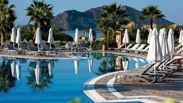 Indoor pool, outdoor pool, open 8:00 AM to 7:00 PM, pool umbrellas