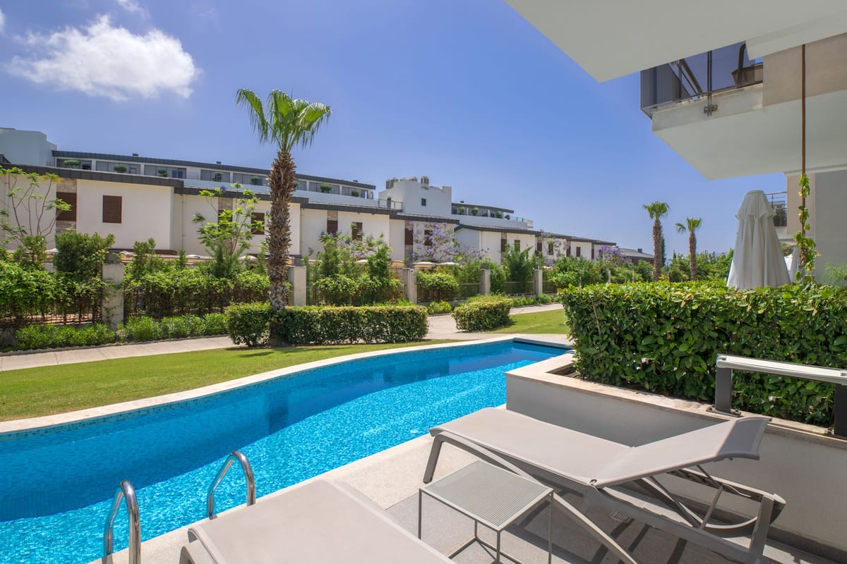 Family Room, Pool Access | Free minibar, in-room safe, desk, iron/ironing board