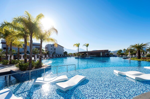 Indoor pool, outdoor pool, open 8:00 AM to 7:00 PM, pool umbrellas