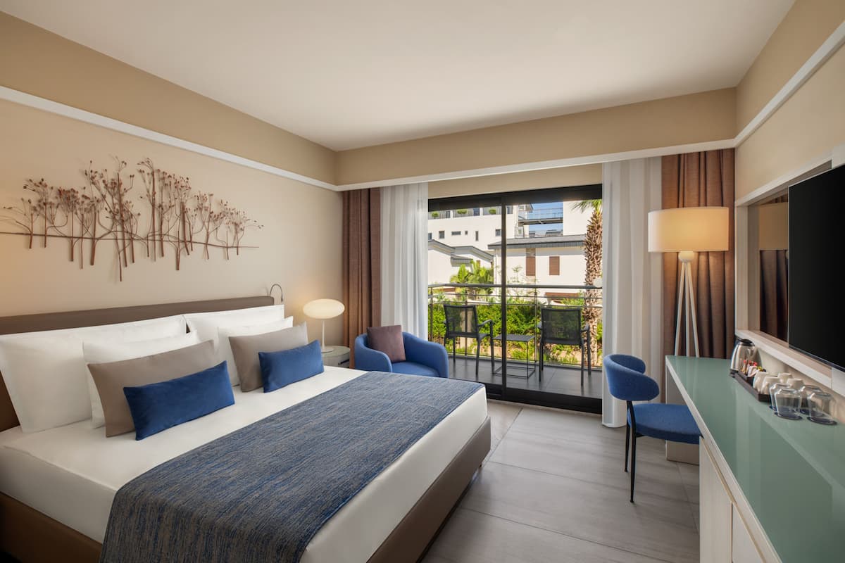 Chambre Familiale, vue jardin | Articles gratuits dans le mini-bar, coffres-forts dans les chambres