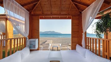 On the beach, sun-loungers, beach umbrellas, beach towels