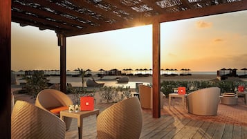 7 bars/lounges, swim-up bar, poolside bar, beach bar