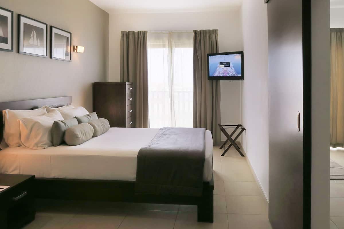 In-room safe, desk, blackout curtains, iron/ironing board