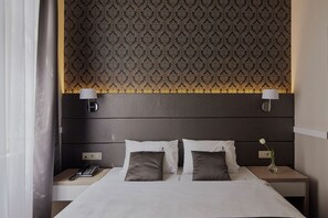 1 kamar tidur, seprai premium, dan setrika/meja setrika