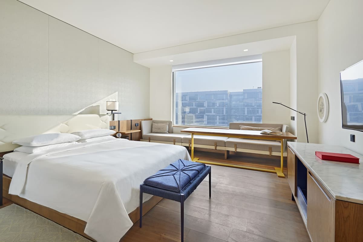 Premium bedding, down comforters, memory foam beds, free minibar items