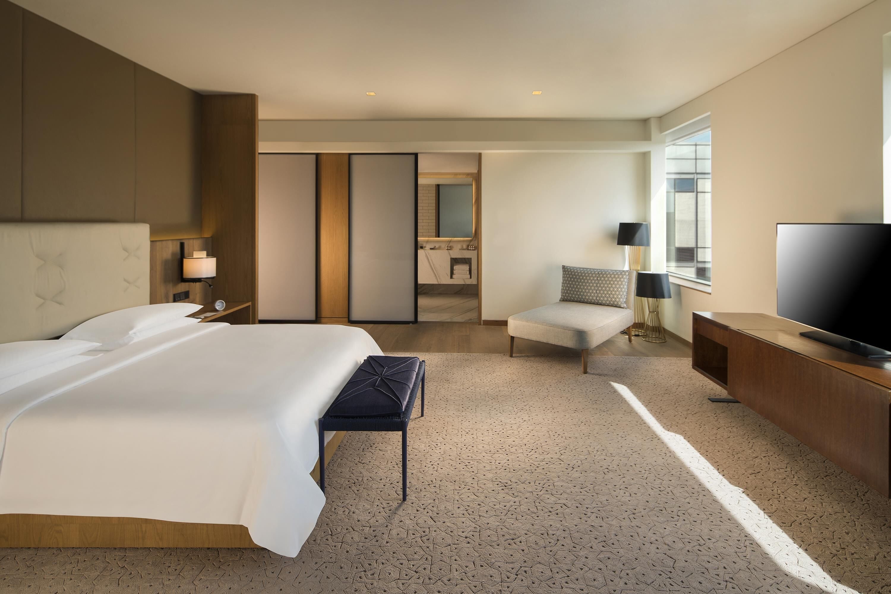 Premium bedding, down duvets, memory-foam beds, free minibar items