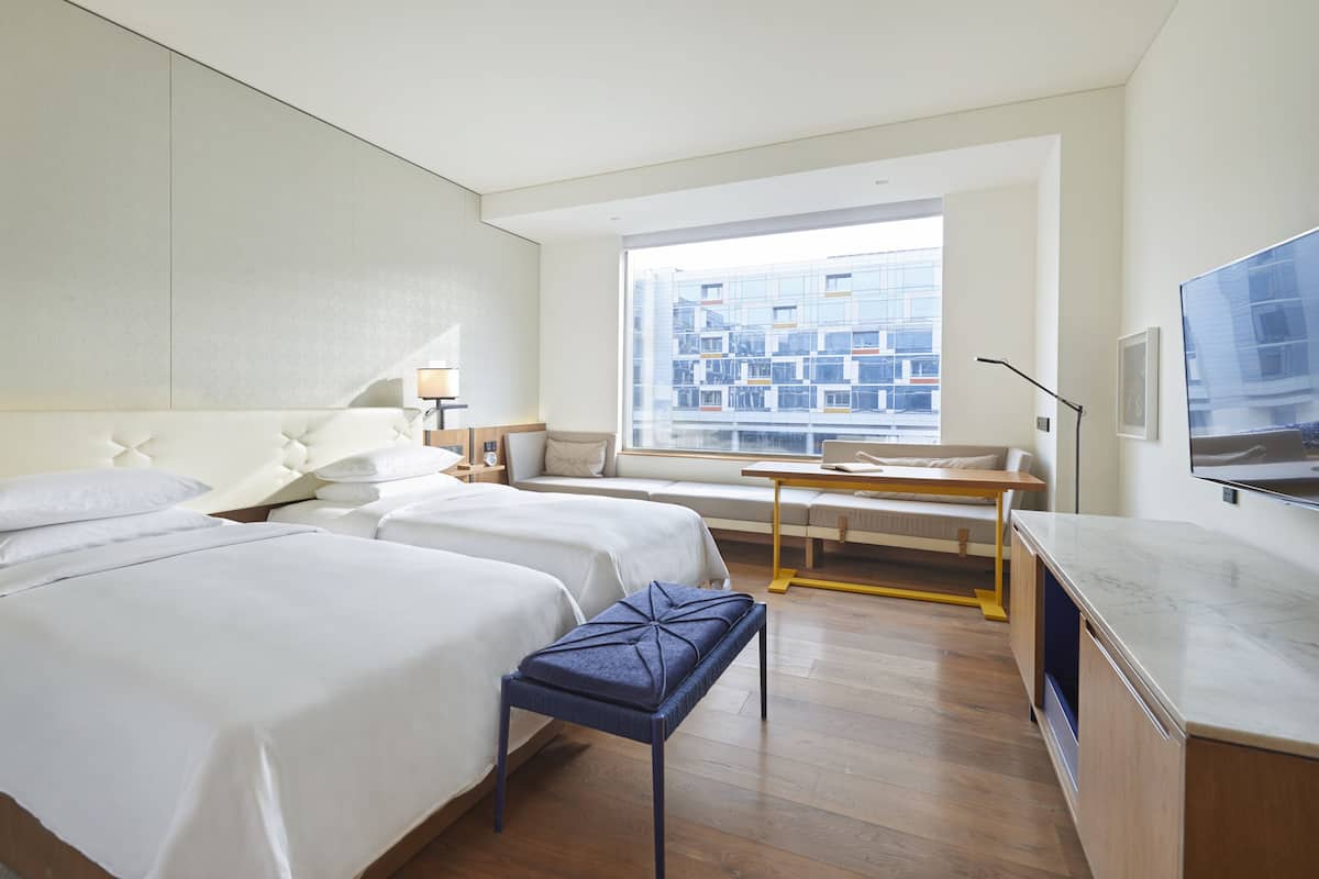 Premium bedding, down comforters, memory foam beds, free minibar items