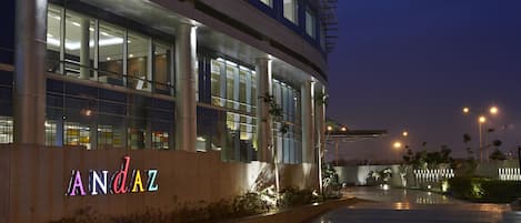 A modern building with a prominent 'ANDAZ' sign on the facade.
