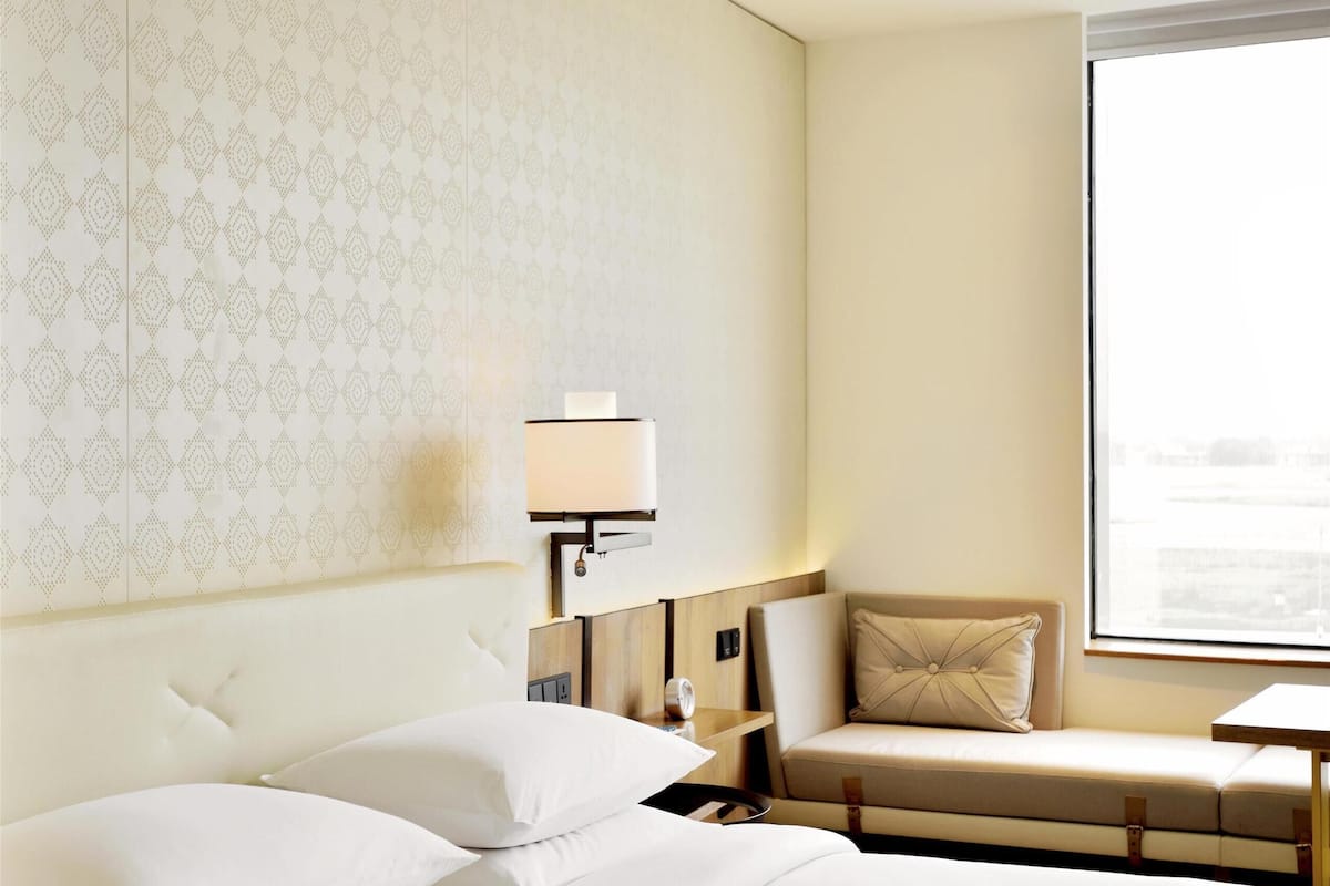 Premium bedding, down comforters, memory foam beds, free minibar items