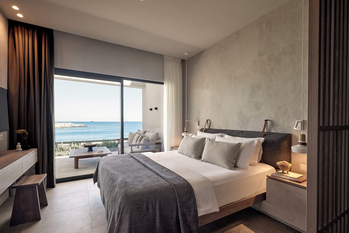 water bungalow private pool & sea view | 1 bedroom, in-room safe, desk, laptop workspace