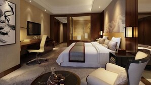 A hotel room with a bed, a desk, a chair, a TV, and a bedside table. - Grand NEW Century Hotel Fuyang (Hangzhou)