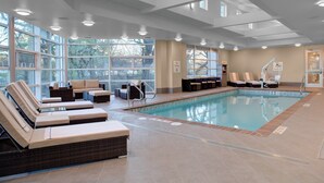 A swimming pool area with lounge chairs and a no diving sign. - Holiday Inn Windsor Wine Country by IHG (Windsor)