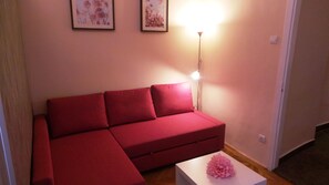 Two Bedroom Apartment with Kitchen, City View | Living area | Flat-screen TV