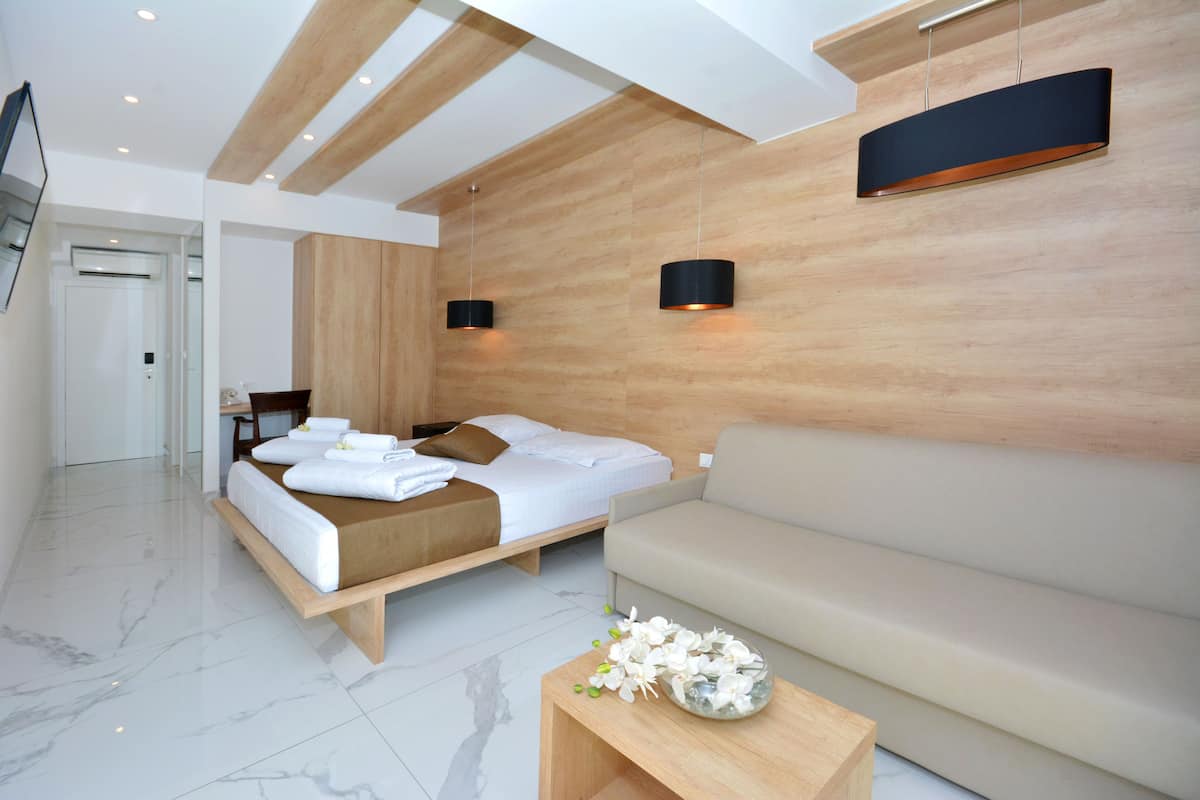 Comfort Quadruple Room, Balcony | Minibar, in-room safe, desk, soundproofing